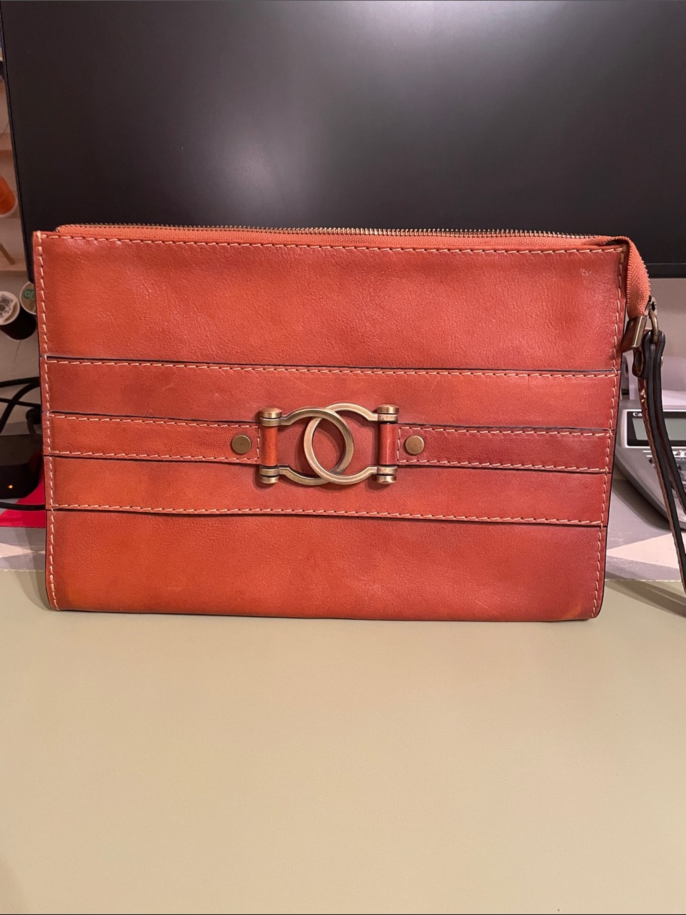 Large leather clutch made in Italy.